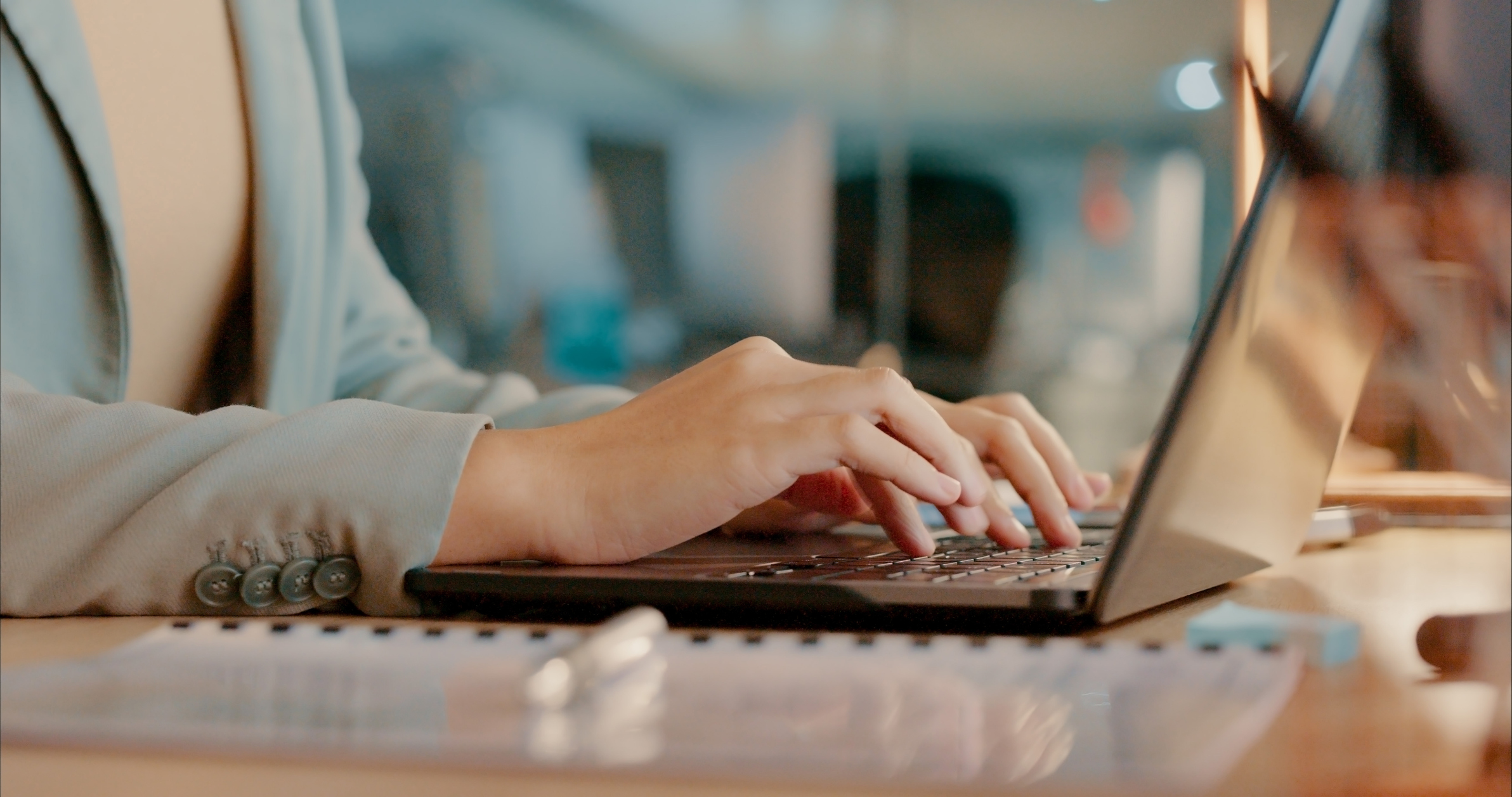laptop and hands typing